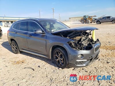 Czwarte zdjęcie samochodu z boku: 2017 BMW X1 XDRIVE28I VIN:WBXHT3C39H5F85148 - miniatura