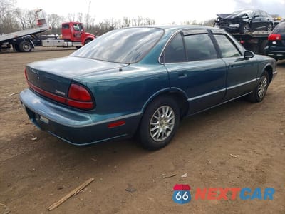 Trzecie zdjęcie samochodu z tyłu: 1998 OLDSMOBILE 88 BASE VIN:1G3HN52K1W4830388 - miniatura