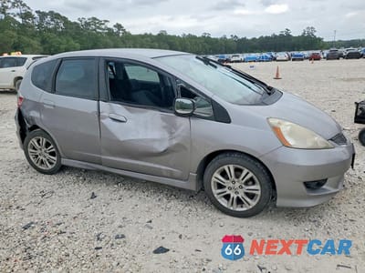 Czwarte zdjęcie samochodu z boku: 2009 HONDA FIT SPORT VIN:JHMGE87459S056703 - miniatura