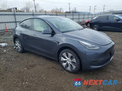 Czwarte zdjęcie samochodu z boku: 2023 TESLA MODEL Y VIN:7SAYGDEE7PA195326 - miniatura