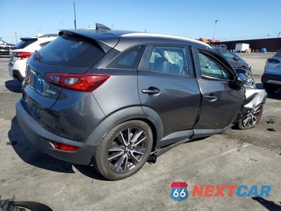 Trzecie zdjęcie samochodu z tyłu: 2018 MAZDA CX-3 TOURING VIN:JM1DKDC75J0313915 - miniatura