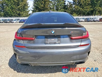 Zdjęcie 6 z 13 samochodu: 2022 BMW M340I VIN:3MW5U7J0XN8C34643 - miniatura