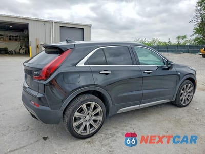 Trzecie zdjęcie samochodu z tyłu: 2019 CADILLAC XT4 PREMIUM LUXURY VIN:1GYFZCR46KF104607 - miniatura