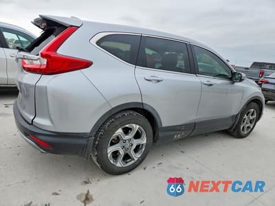 Trzecie zdjęcie samochodu z tyłu: 2018 HONDA CR-V EX VIN:7FARW1H51JE041269 - miniatura