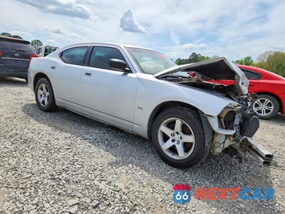Czwarte zdjęcie samochodu z boku: 2009 DODGE CHARGER SXT VIN:2B3KA33V39H540208 - miniatura
