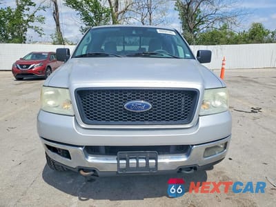 Piąte zdjęcie samochodu w środku: 2005 FORD F150 VIN:1FTPX14555FA70183 - miniatura