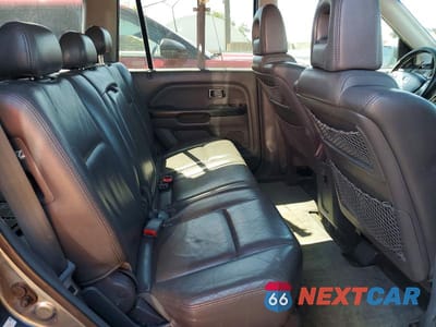 Zdjęcie 11 z 13 samochodu: 2005 HONDA PILOT VIN:5FNYF18525B046798 - miniatura