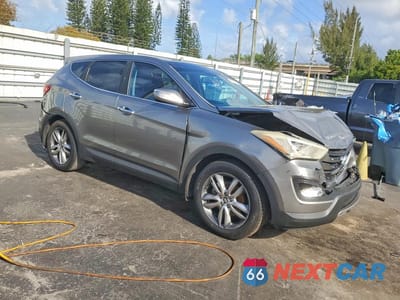 Czwarte zdjęcie samochodu z boku: 2013 HYUNDAI SANTA FE SPORT 2.0T VIN:5XYZW3LA4DG065798 - miniatura