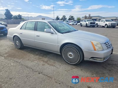 Czwarte zdjęcie samochodu z boku: 2009 CADILLAC DTS VIN:1G6KD57Y39U105629 - miniatura