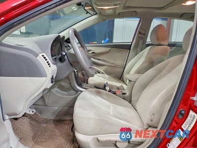 Zdjęcie 7 z 11 samochodu: 2010 TOYOTA COROLLA LE VIN:1NXBU4EE2AZ189586 - miniatura