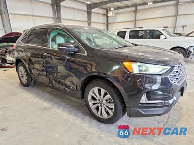 Czwarte zdjęcie samochodu z boku: 2019 FORD EDGE TITANIUM VIN:2FMPK4K94KBC02736 - miniatura