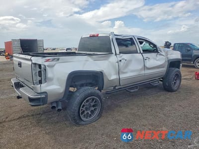 Trzecie zdjęcie samochodu z tyłu: 2017 CHEVROLET SILVERADO K1500 LT VIN:3GCUKREC5HG190775 - miniatura