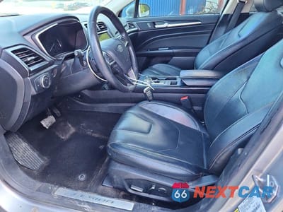 Zdjęcie 7 z 13 samochodu: 2020 FORD FUSION TITANIUM VIN:3FA6P0D92LR117376 - miniatura