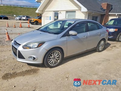 2014 FORD FOCUS TITANIUM 1FADP3J23EL128579 - główne zdjęcie licytacji z USA - miniatura