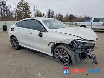 Czwarte zdjęcie samochodu z boku: 2021 BMW X6 M50I VIN:5UXCY8C02M9H68663 - miniatura