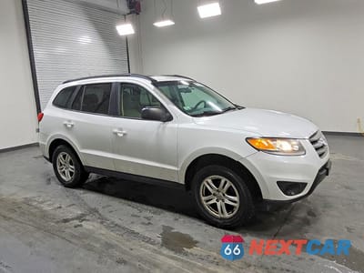 Czwarte zdjęcie samochodu z boku: 2012 HYUNDAI SANTA FE GLS VIN:5XYZG3AB9CG142804 - miniatura