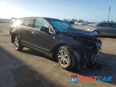 Czwarte zdjęcie samochodu z boku: 2023 CADILLAC XT5 PREMIUM LUXURY VIN:1GYKNDRSXPZ169349 - miniatura