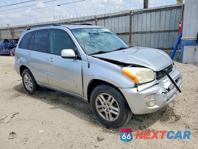 Czwarte zdjęcie samochodu z boku: 2003 TOYOTA RAV4 BASE VIN:JTEGH20V630110128 - miniatura