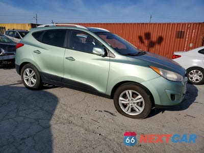 Czwarte zdjęcie samochodu z boku: 2011 HYUNDAI TUCSON GLS VIN:KM8JU3AC2BU291014 - miniatura