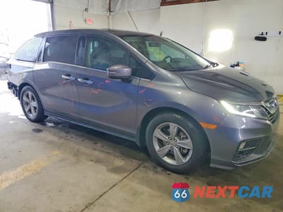 Czwarte zdjęcie samochodu z boku: 2018 HONDA ODYSSEY EXL VIN:5FNRL6H74JB036182 - miniatura
