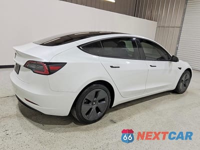 Trzecie zdjęcie samochodu z tyłu: 2021 TESLA MODEL 3 VIN:5YJ3E1EA6MF099565 - miniatura