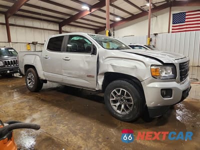 Czwarte zdjęcie samochodu z boku: 2018 GMC CANYON SLE VIN:1GTG6CEN7J1156678 - miniatura