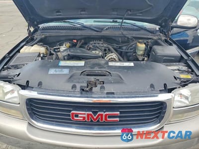 Zdjęcie 11 z 11 samochodu: 2000 GMC NEW SIERRA K1500 VIN:1GTEK19T2YE289514 - miniatura