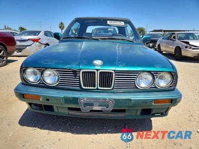 Piąte zdjęcie samochodu w środku: 1992 BMW 318 I VIN:WBABA731XNEJ12038 - miniatura