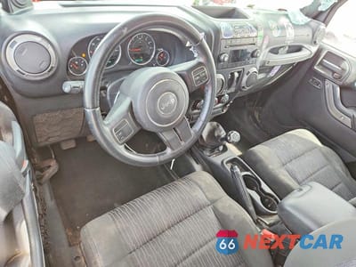 Zdjęcie 8 z 12 samochodu: 2012 JEEP WRANGLER SPORT VIN:1C4AJWAG9CL270587 - miniatura
