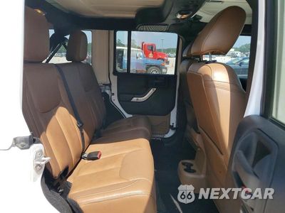Zdjęcie 11 z 13 samochodu: 2015 JEEP WRANGLER UNLIMITED SAHARA VIN:1C4BJWEG4FL540926 - miniatura
