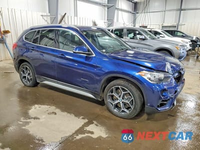 Czwarte zdjęcie samochodu z boku: 2018 BMW X1 XDRIVE28I VIN:WBXHT3C39J5K29558 - miniatura