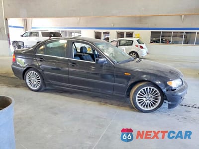 Czwarte zdjęcie samochodu z boku: 2003 BMW 330 I VIN:WBAEV53433KM30503 - miniatura