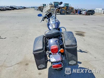 Czwarte zdjęcie samochodu z boku: 2013 HARLEY-DAVIDSON FLD SWITCHBACK VIN:1HD1GZM38DC335759 - miniatura