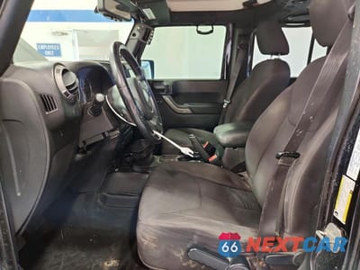 Zdjęcie 7 z 12 samochodu: 2013 JEEP WRANGLER UNLIMITED SPORT VIN:1C4BJWDG1DL506005 - miniatura