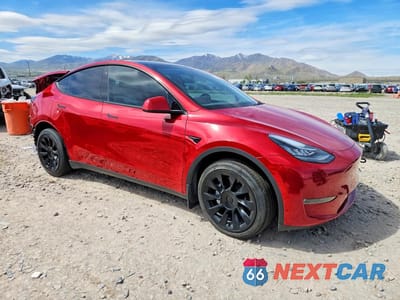 Czwarte zdjęcie samochodu z boku: 2023 TESLA MODEL Y VIN:7SAYGDEE8PA098846 - miniatura
