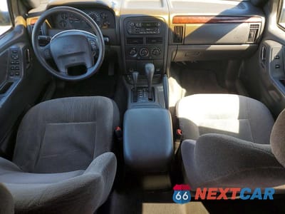 Zdjęcie 8 z 12 samochodu: 2000 JEEP GRAND CHEROKEE LAREDO VIN:1J4GW48S0YC187528 - miniatura