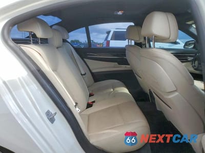 Zdjęcie 10 z 13 samochodu: 2014 BMW 740 I VIN:WBAYA6C50ED144154 - miniatura