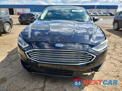Piąte zdjęcie samochodu w środku: 2018 FORD FUSION SE VIN:3FA6P0HD9JR255041 - miniatura