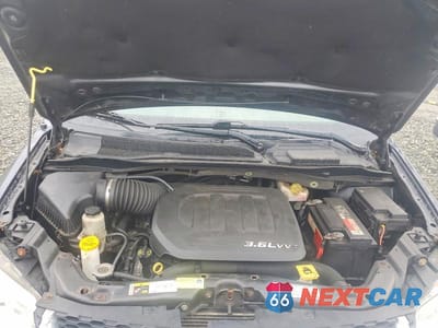 Zdjęcie 12 z 13 samochodu: 2013 DODGE GRAND CARAVAN SE VIN:2C4RDGBG2DR628958 - miniatura