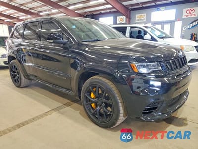 Czwarte zdjęcie samochodu z boku: 2018 JEEP GRAND CHEROKEE TRACKHAWK VIN:1C4RJFN95JC310109 - miniatura
