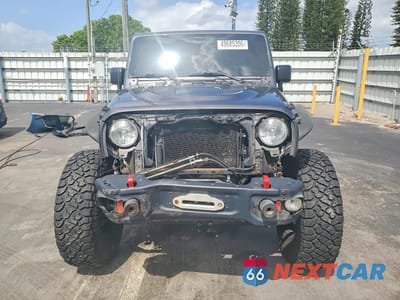 Piąte zdjęcie samochodu w środku: 2016 JEEP WRANGLER UNLIMITED RUBICON VIN:1C4BJWFG4GL251951 - miniatura