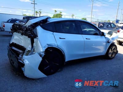 Trzecie zdjęcie samochodu z tyłu: 2026 TESLA MODEL Y VIN:7SAYGDEDXTA418573 - miniatura