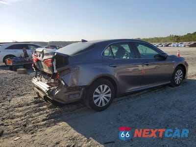 Trzecie zdjęcie samochodu z tyłu: 2019 TOYOTA CAMRY HYBRID LE VIN:4T1B31HK6KU510405 - miniatura