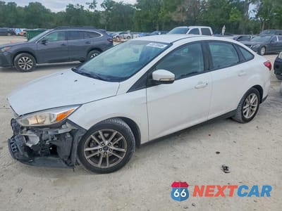 2016 FORD FOCUS SE 1FADP3F25GL401484 - główne zdjęcie licytacji z USA - miniatura