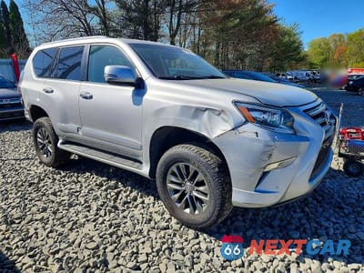 Czwarte zdjęcie samochodu z boku: 2014 LEXUS GX 460 PREMIUM VIN:JTJJM7FX4E5077791 - miniatura