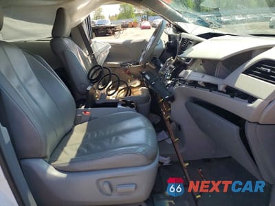 Zdjęcie 7 z 13 samochodu: 2014 TOYOTA SIENNA XLE 8-PASSENGER VIN:5TDYK3DC1ES472750 - miniatura