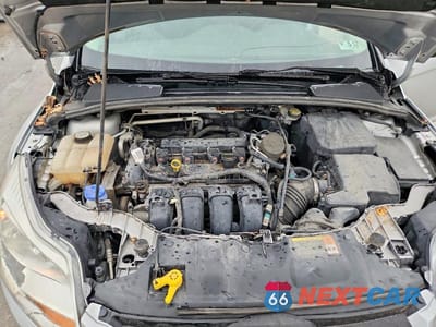 Zdjęcie 11 z 12 samochodu: 2013 FORD FOCUS S VIN:1FADP3E28DL181898 - miniatura