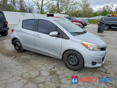 Czwarte zdjęcie samochodu z boku: 2014 TOYOTA YARIS 5-DOOR L VIN:JTDKTUD30ED591118 - miniatura