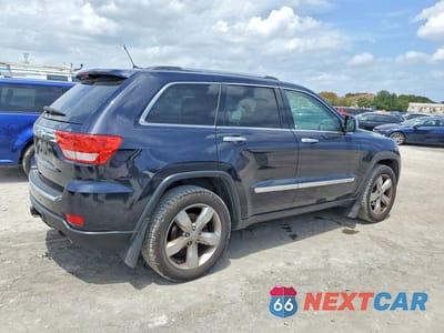 Trzecie zdjęcie samochodu z tyłu: 2011 JEEP GRAND CHEROKEE OVERLAND VIN:1J4RR6GG9BC628797 - miniatura