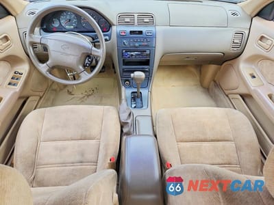 Zdjęcie 8 z 12 samochodu: 1998 NISSAN MAXIMA GXE VIN:JN1CA21DXWT607119 - miniatura